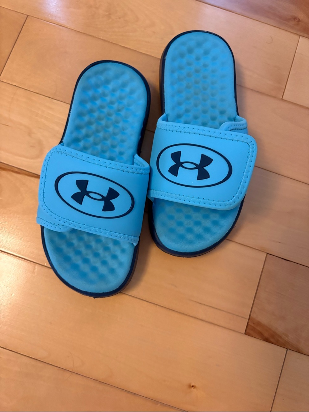 Under Armour Youth Light Blue Slide Sandals with Navy Logo